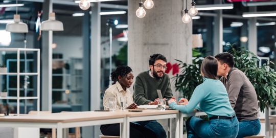 A team discussing solutions and budget trade-offs as part of a design to cost approach aimed at optimising costs from the design phase onwards.