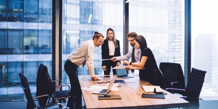 A procurement team and finance department reviewing contractual documents to define or renegotiate escalation clauses that adjust prices to market index developments.