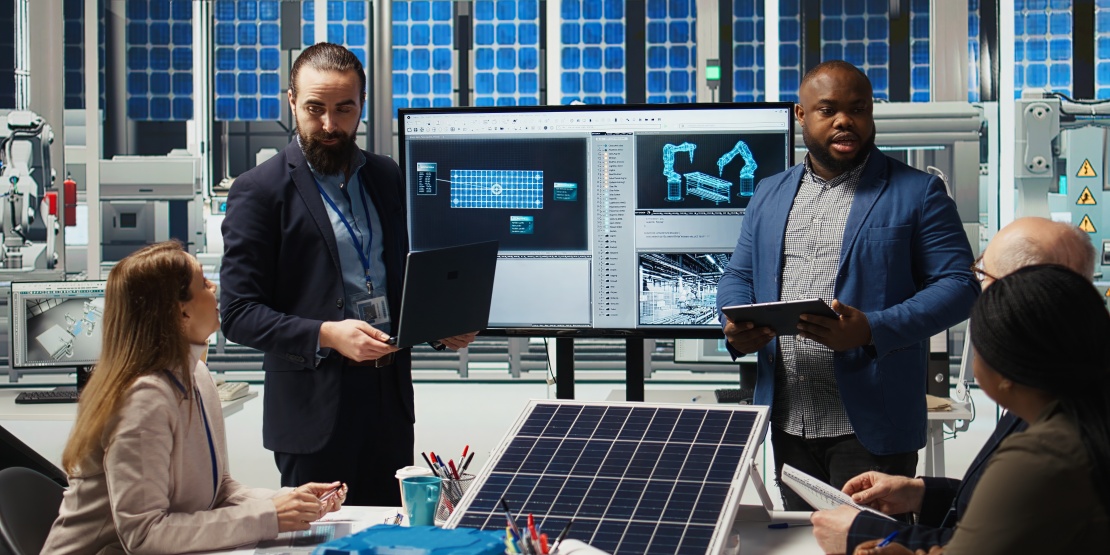 Staff members discuss a technology and energy project that exemplifies an approach based on industrial symbiosis. 