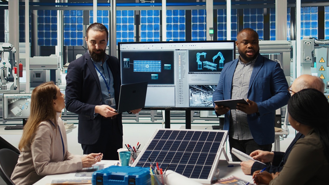 Staff members discuss a technology and energy project that exemplifies an approach based on industrial symbiosis. 