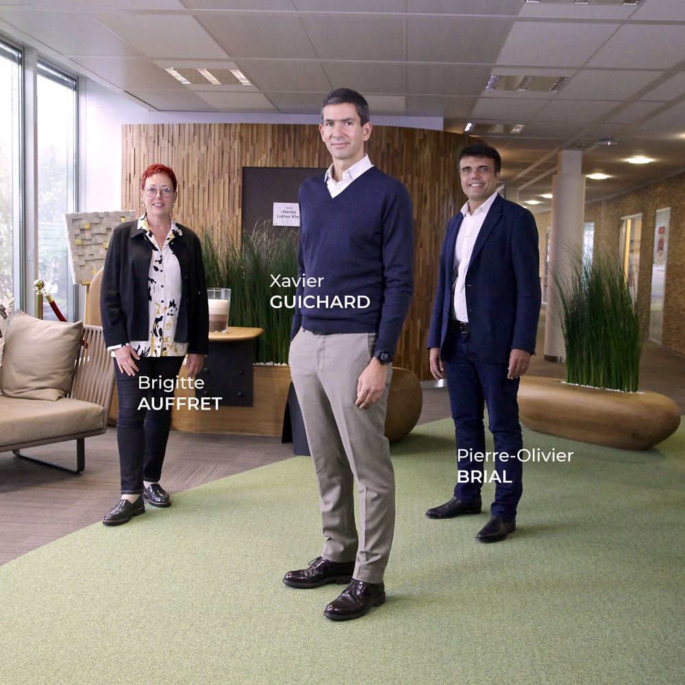 Photo des trois dirigeants de Manutan
