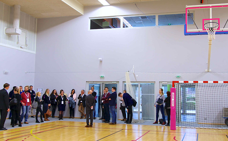 Group of people visiting Manutan gymnasium