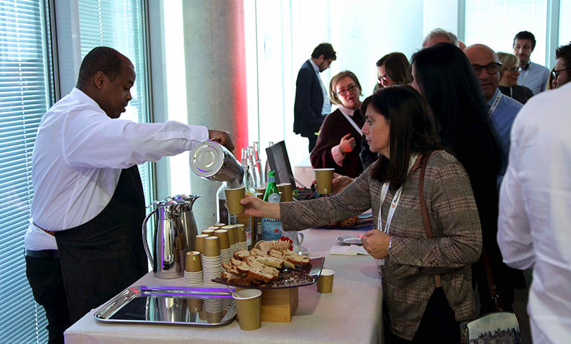 Visitors chat and have a snack during Manutan Pushasing Day 2019