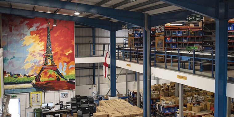 Photos of murals in the ironmongeryDirect and ElectricalDirect warehouse 